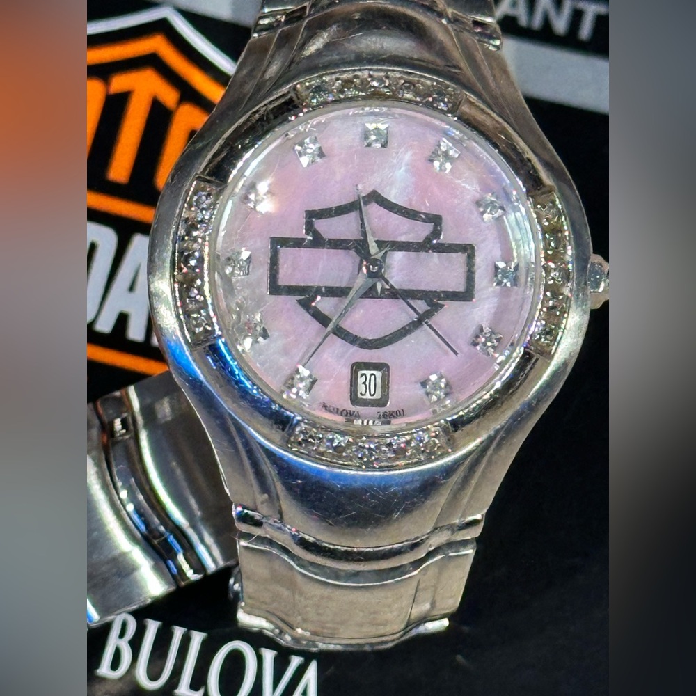 Harley Davidson Bulova Watch with Pink Mother of Pearl Face and Diamond Accents.